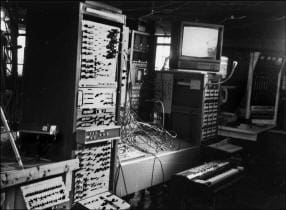 A black and white photo of an old computer.