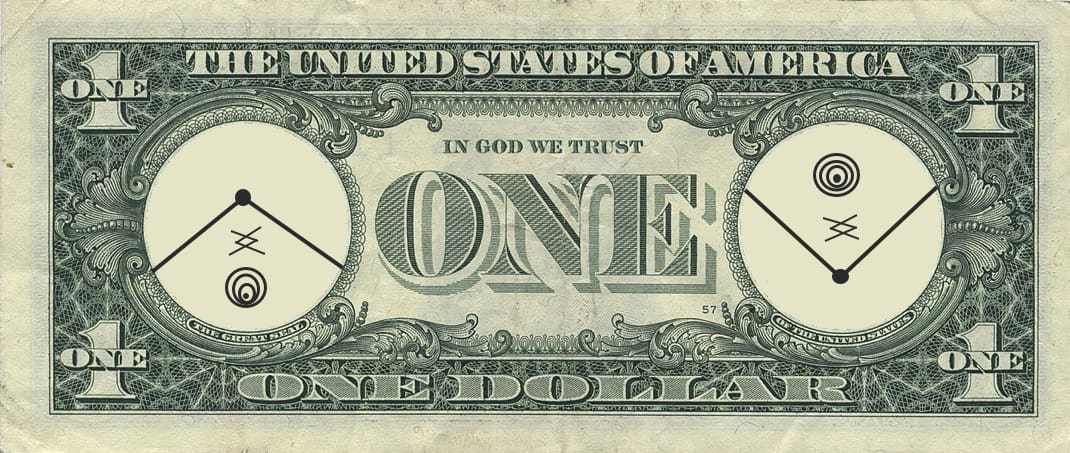 A close up of the back side of a one dollar bill