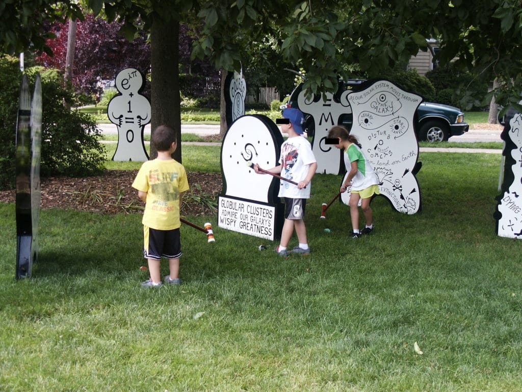 Kids play in the day. And a symbol of The Big Bang